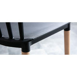 Kosmi Chaise Style scandinave à barreaux modèle Pop - Coque en résine Noire et Pieds en Bois Naturel