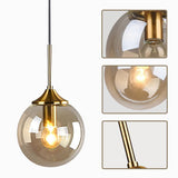 KCO Suspension moderne en forme de globe en verre avec abat-jour ambré et laiton doré pour cuisine, entrée, salle à manger (ambre)