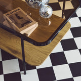 sweeek - Table Basse Vintage en métal Noir avec 2 Plateaux (Verre et décor Bois). Bords arrondis