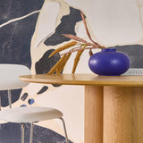 sweeek - Table à Manger Ronde Bois d'hévéa et placage chêne Naturel 4 Places 130cm - Leonore