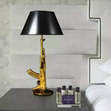 Lampe de chevet hôtel spot ak47 doré lampe de table pistolet lampe de table hôtel créatif décoration simple personnalité @ 2